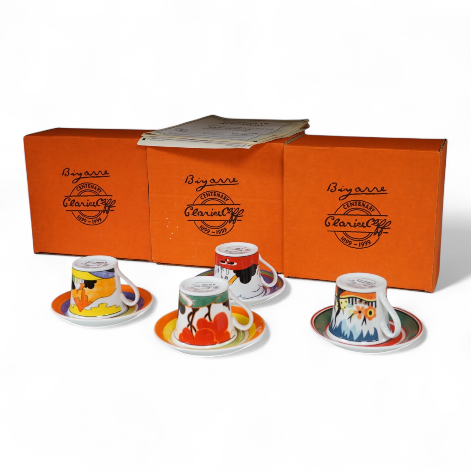 Four boxed limited edition Clarice Cliff cups and saucers to include Fantasque Mountain and Red Autumn, saucers 11.5cm in diameter